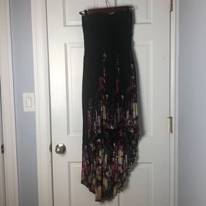 Black bandage top dress and pleated high low skirt